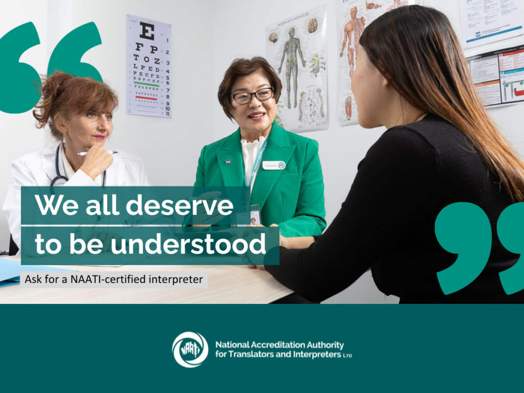 a photo of three people around a desk in a healthcare setting