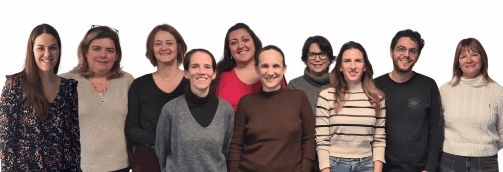 a photo of nine women and one man